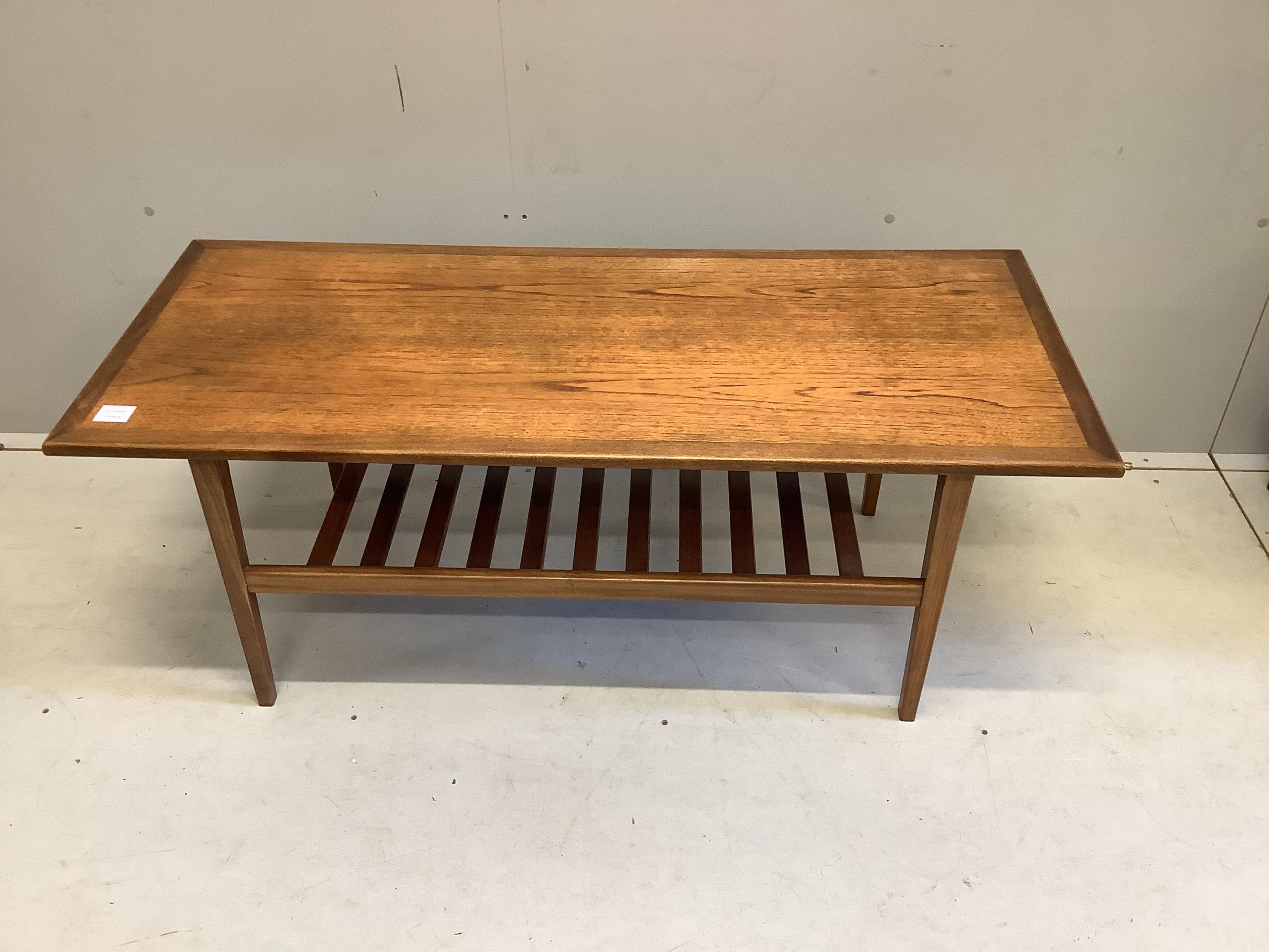A mid century rectangular teak two tier coffee table, width 122cm, depth 51cm, height 48cm